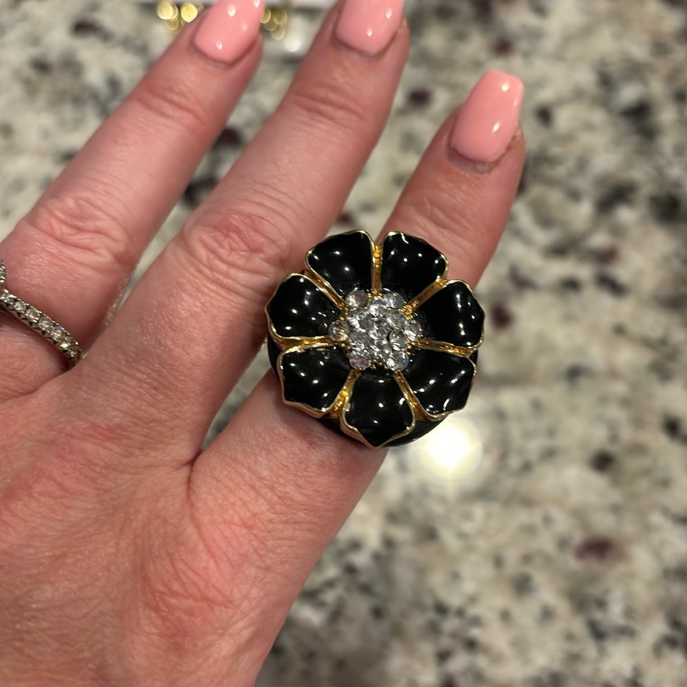 Black plastic flower ring